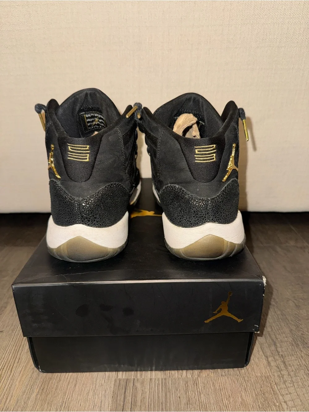 Jordan Black with Gold Accent High-Top Sneakers